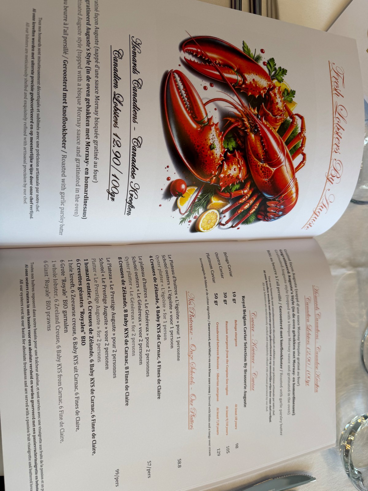 Page menu Auguste : homards canadiens vivants, caviar Royal belge