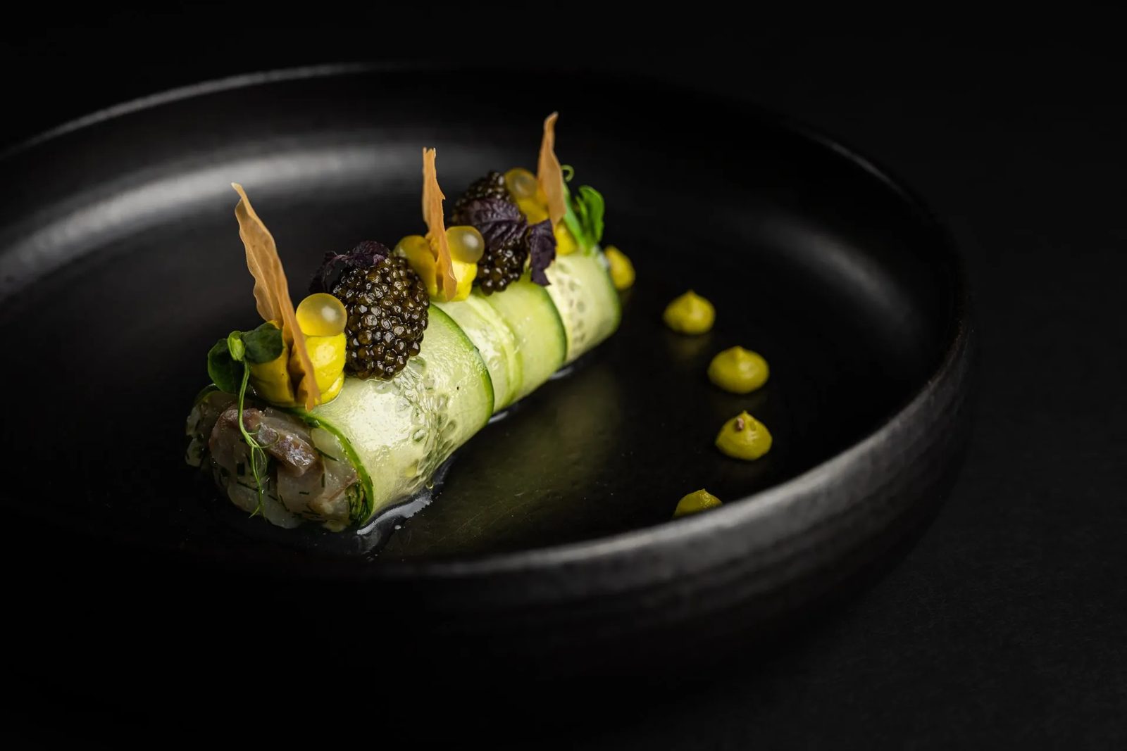 A starter from the menu, plated with caviar