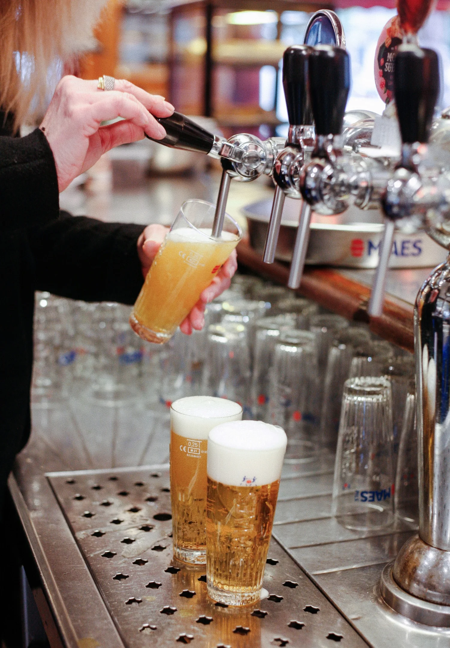 The beer taps at the counter of Plattesteen in Brussels