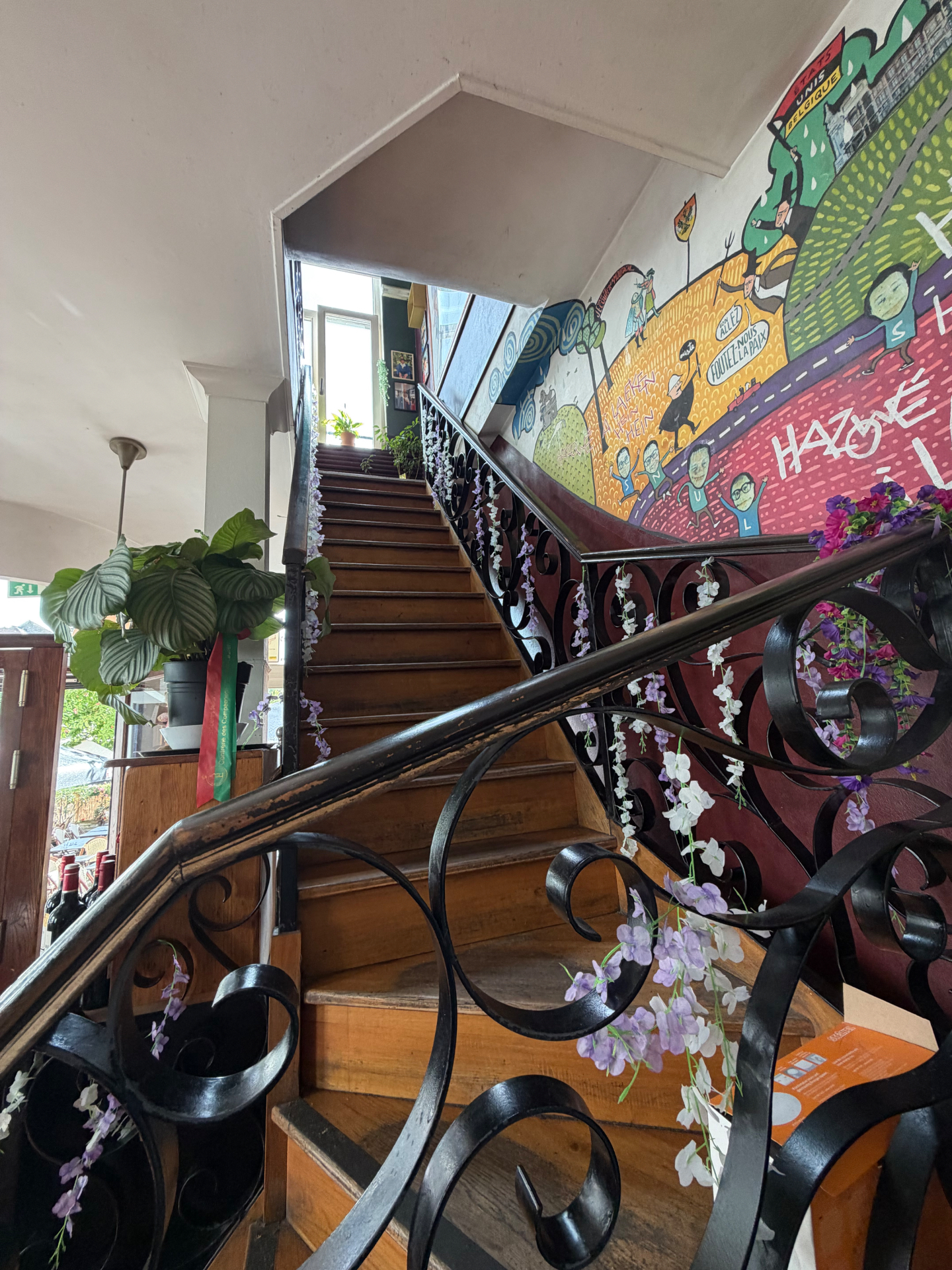 Staircase and Brussels mural at Le Saint d’Hic III